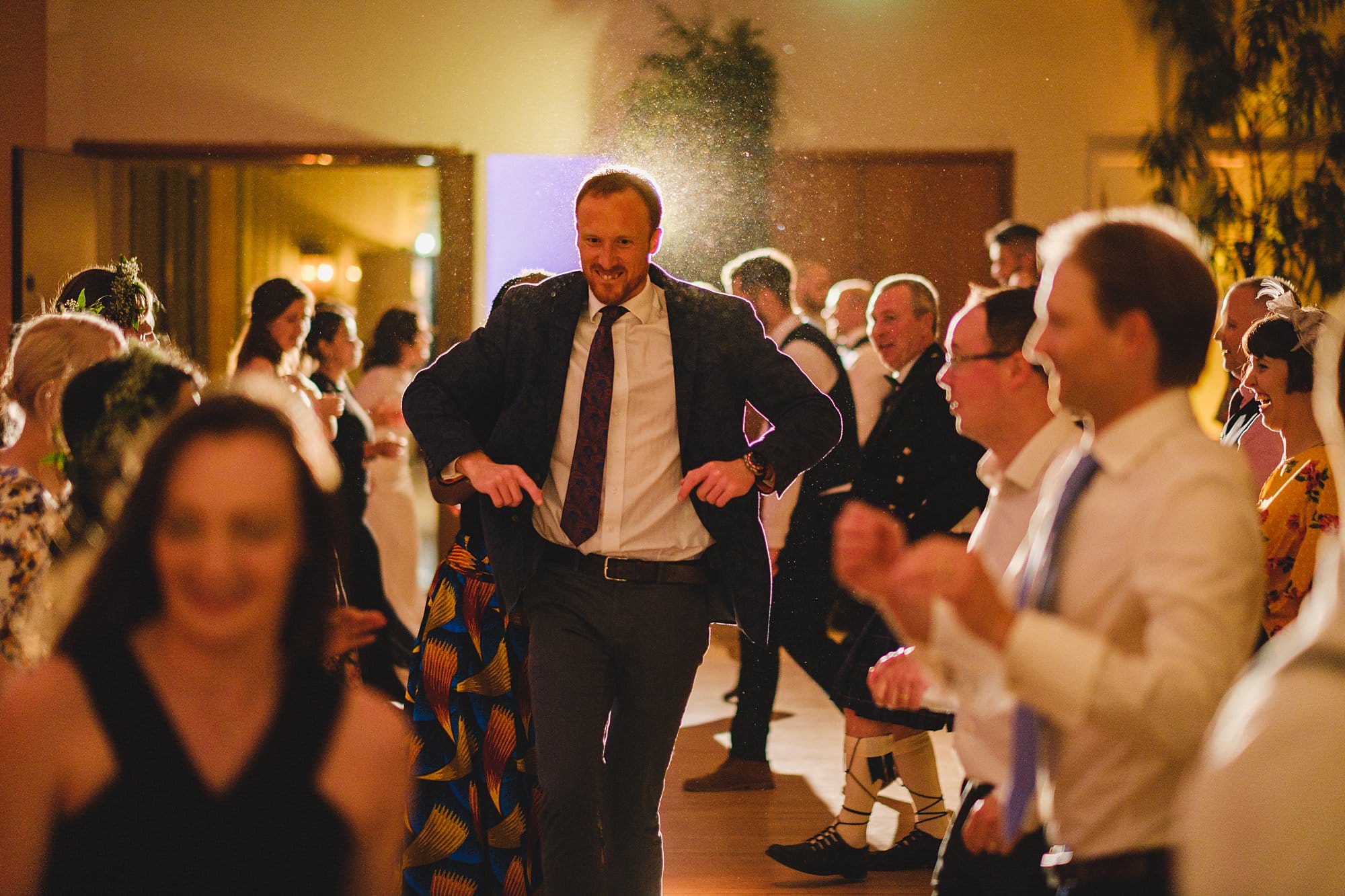 ceilidh dancing at a hurlingham club wedding