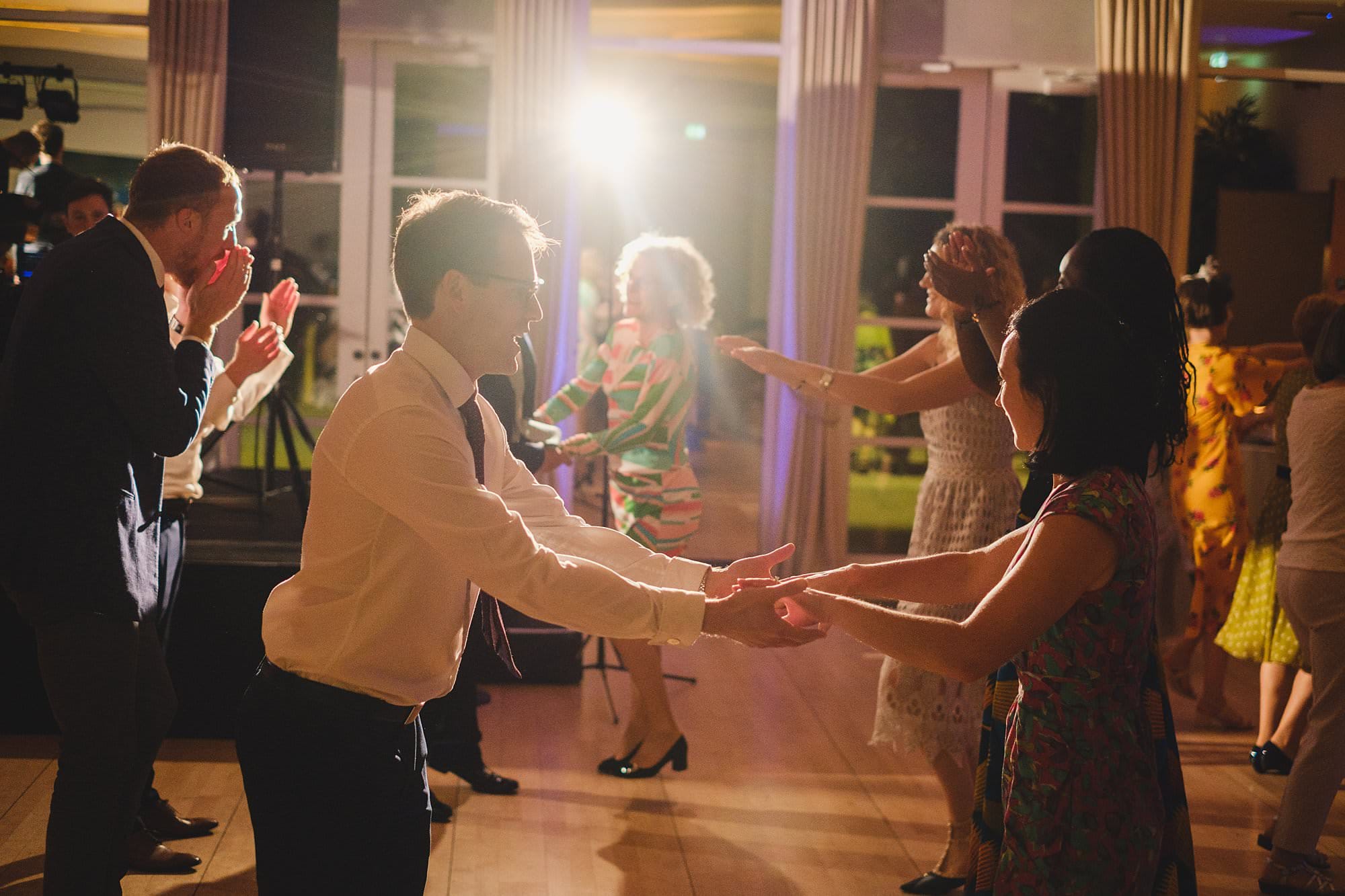 ceilidh dancing at a hurlingham club wedding